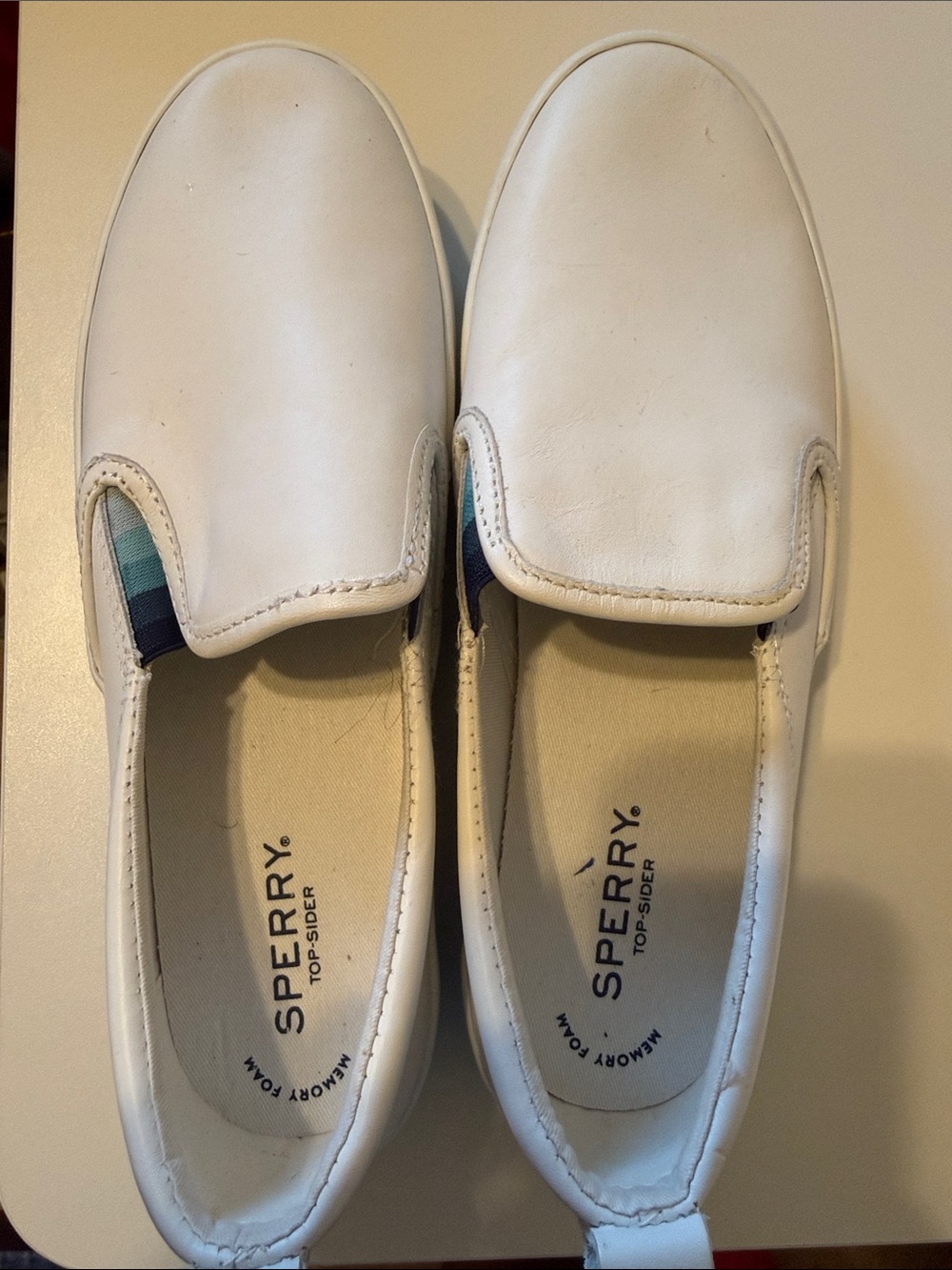 Sperry White Leather Slip-On Loafers with Blue Stripe Accent